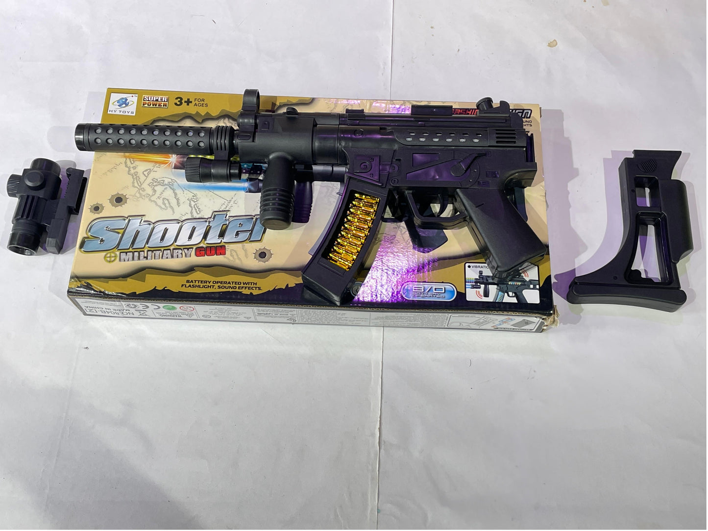 Toy Gun for kids great for Soldier Army Military . This durable plastic toy Gun emits combat sounds lights and vibration