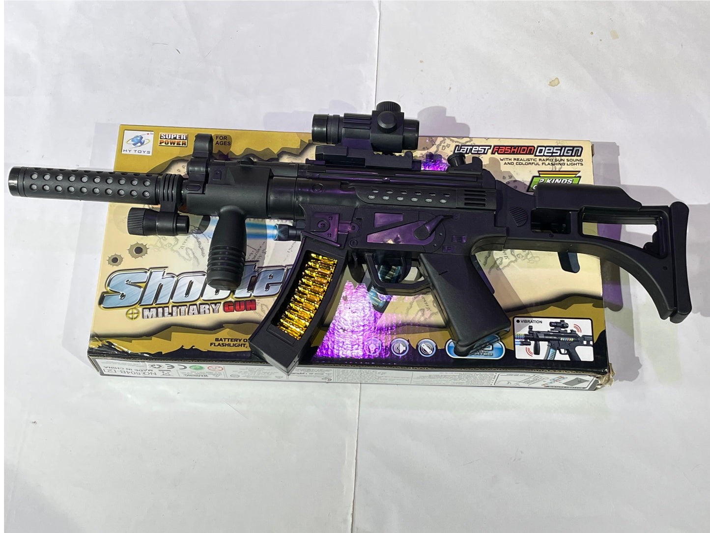 Toy Gun for kids great for Soldier Army Military . This durable plastic toy Gun emits combat sounds lights and vibration